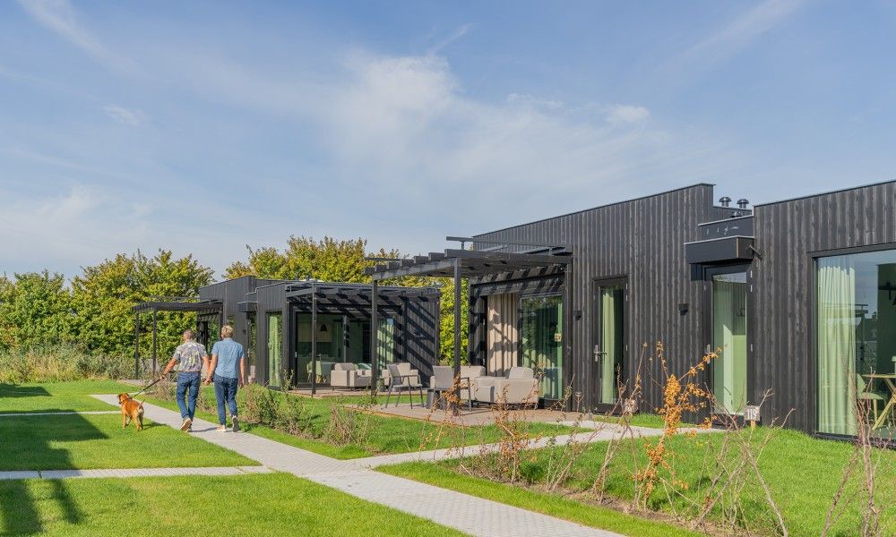 Walking trail along lodges at Buitenplaats Hotel, bed and breakfast in Ellemeet, Schouwen-Duiveland, Zeeland.