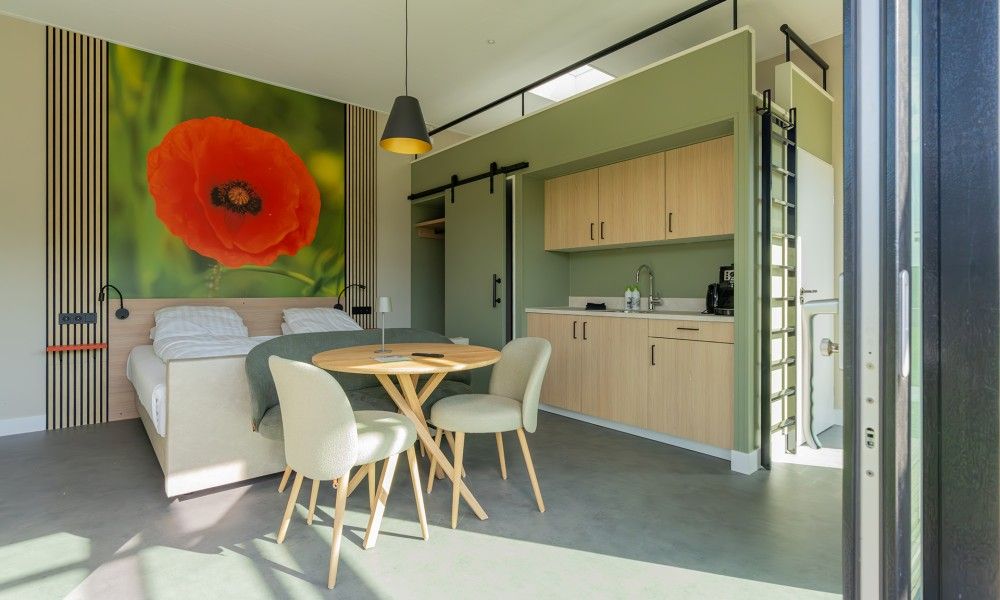 Stylish indoor room with kitchenette at Buitenplaats Hotel, bed and breakfast in Ellemeet, Schouwen-Duiveland, Zeeland.