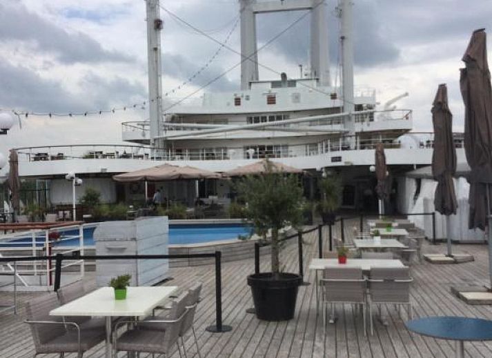 Cozy bedroom in Imagine My B&B Rotterdam with double bed and atmospheric lighting.