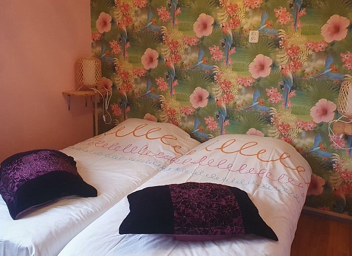 Bright bedroom at Susanna's bedandbreakfast in Emmen, featuring modern conveniences and inviting decor.