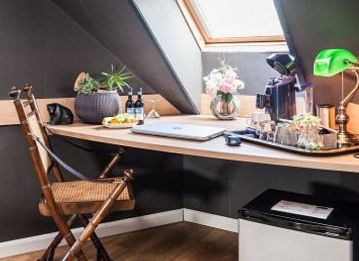 Gezellige slaapkamer in Huisje in Stieltjeskanaal, Zuidoost Drenthe, met modern interieur en comfortabele bedden.