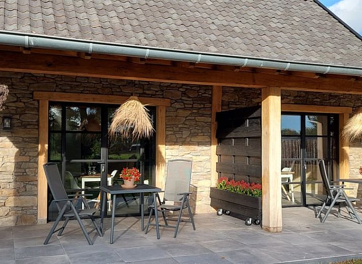 Geniessen Sie die gemuetliche Veranda im Ferienhaus in Stroe, Veluwe, Gelderland.