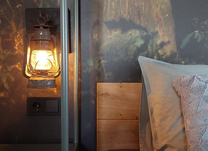 Attractive bedroom in Holiday Home in Stroe, Veluwe, with deer decor.