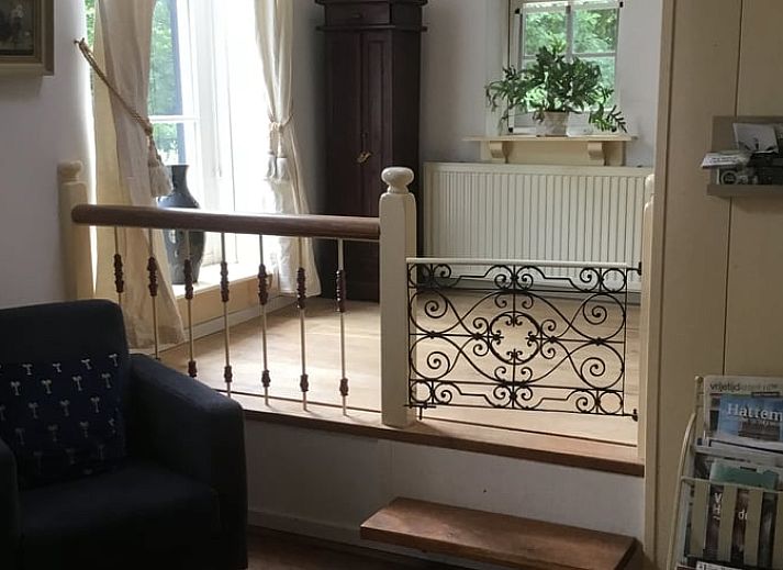 Vakantiehuis in Oene biedt een charmante tuin met kippen, ideaal voor natuurliefhebbers in de Veluwe, Gelderland.