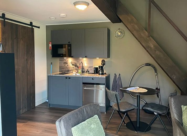 Gezellig vakantiehuisje in Noordwijk, Zuidwest Groningen, omringd door groen, ideaal voor een ontspannen verblijf.