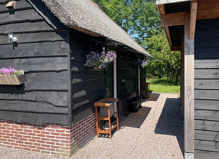 Houten loft in Vakantiehuisje in Noordwijk, Zuidwest Groningen.
