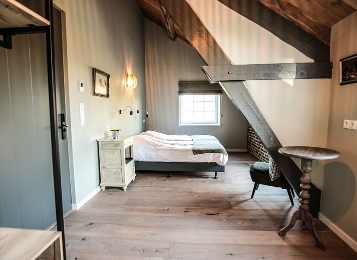 Cozy indoor area of Hof van Kleeberg in Kleeberg, South Limburg, with comfortable seating.