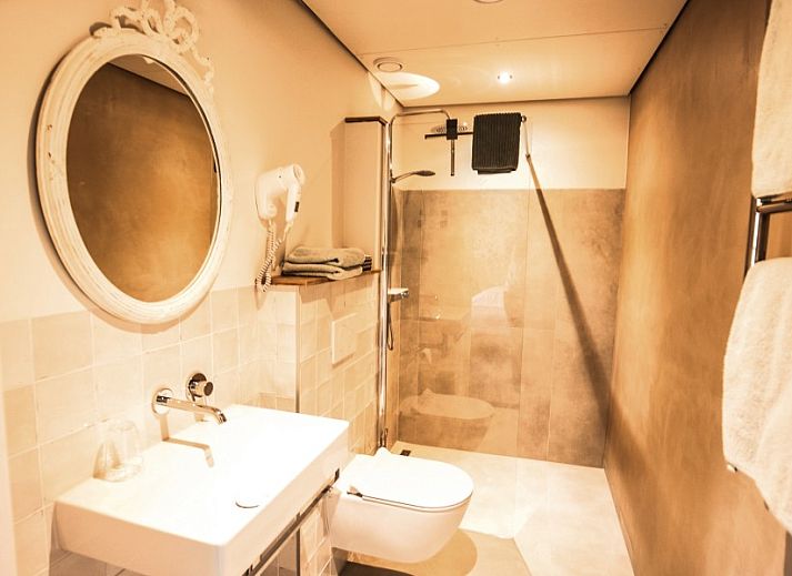 Cozy indoor area of Hof van Kleeberg in Kleeberg, South Limburg, with comfortable seating.