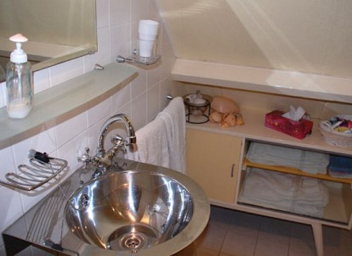 B&B Paula in Haarlem offers a charming exterior with an inviting terrace, ideal for a relaxing stay on the North Sea coast.