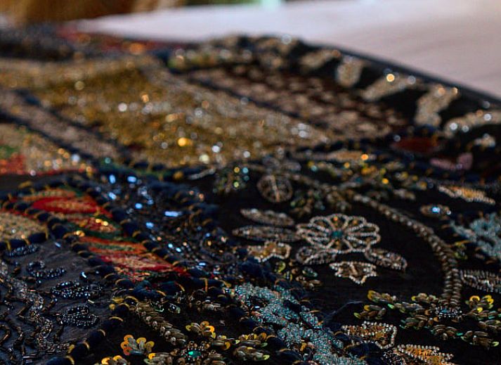 Hanging flower baskets and colorful flowers at Holiday home in Oldenzaal, a rustic stay in Twente.