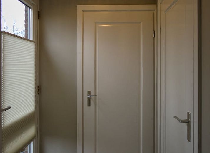 Intimate terrace with seating at Holiday home in Oldenzaal, Twente, ideal for relaxing moments in nature.