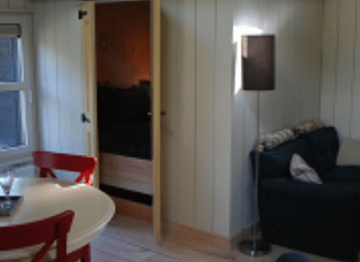 Vakantiehuis in Hellendoorn met charmante gevel en gezellige veranda in Salland, Overijssel.