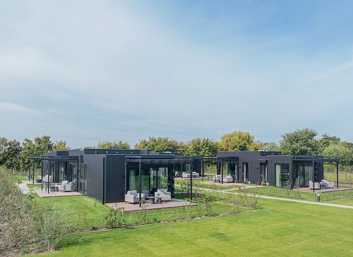 Guests relax on the terrace of Buitenplaats Hotel, bed and breakfast in Ellemeet, Schouwen-Duiveland, Zeeland.