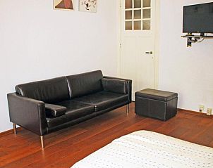 Comfortabele zithoek in Bed & Breakfast Walenburg, Rotterdam, Zuid-Holland.
