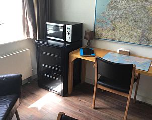 Espresso-apparaat en selectie koffiecapsules in Imagine My B&B Rotterdam.