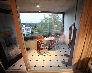 Zonnig balkon met zitje bij B&B de Singel, Utrecht. Ontspan in deze bed and breakfast in Utrecht eo.