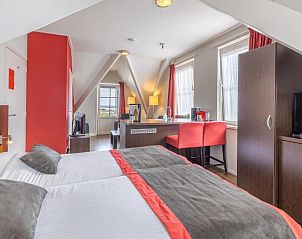 Slaapkamer met zithoek in Bed & Breakfast Huys aan zee, Domburg, Walcheren.