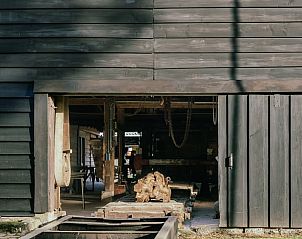Authentieke schuur bij Vakantiehuisje in Heerde, Veluwe, toont rustieke charme in Gelderland.