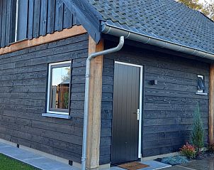 Authentieke houten buitenkant van Huisje in Stroe, Stroe, Veluwe, Gelderland.