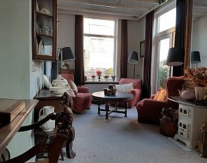 Comfortabele woonkamer in Gasthof de Tukkel, Heeten, perfect voor ontspanning in de rust van Salland, Overijssel.