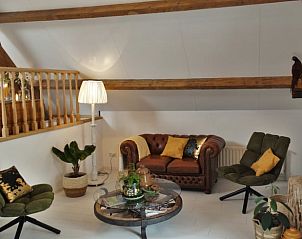 Comfortabele zithoek in Huisje in Arnemuiden, bed and breakfast in Arnemuiden.