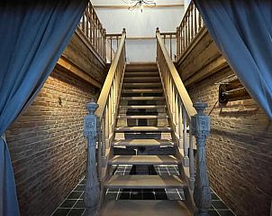 Imposante trap in Huisje in Arnemuiden, vakantieaccommodatie in Arnemuiden, Zeeland.